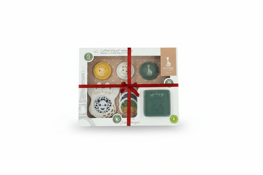 "Sophie la girrafe" sensory gift setin grey background